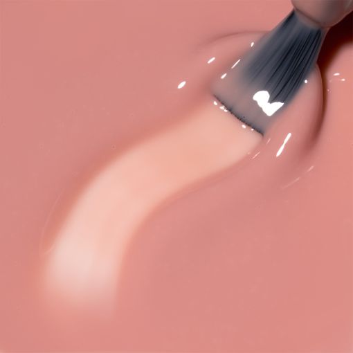 rubber_base_timeless_golden_blush_c8728_c Nahaufnahme von cremigem Makeup in rosa mit Pinsel