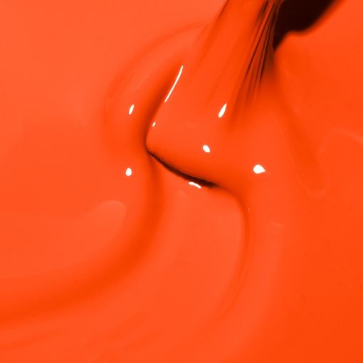 Nahaufnahme von orangefarbenem Lack, der aus einem Behälter fließt