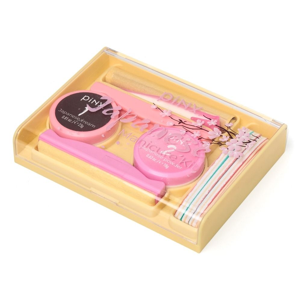 Kosmetikset in rosa-gelber Verpackung mit Creme, Puder, Applikator und Tüchern für Make-up