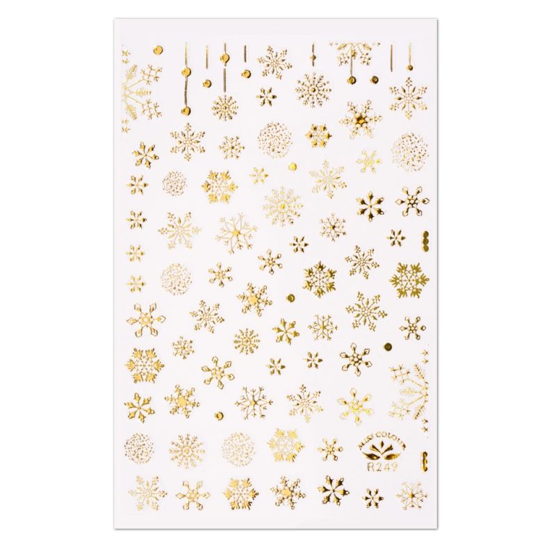 Sticker mit goldenen Schneeflocken Motiven auf weißem Hintergrund