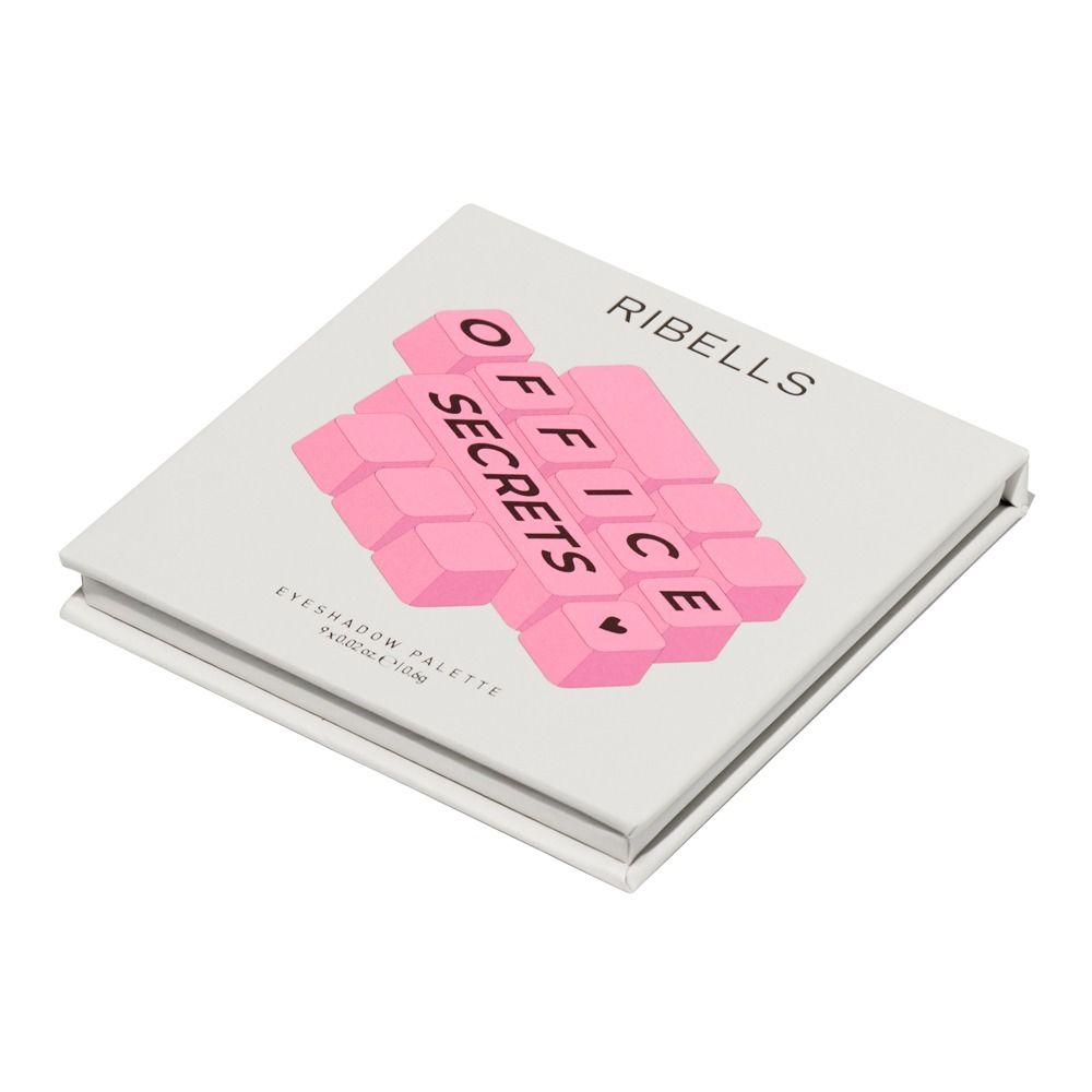 Ribells Office Secrets Eyeshadow Palette, weiße Make-up-Palette mit pinkem Blockdesign und Schriftzug auf der Verpackung