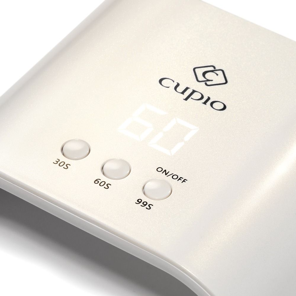 Detailansicht der weißen Cupio UV/LED Nagellampe mit digitaler 60-Sekunden-Anzeige und Timer-Tasten für 30s, 60s, 99s sowie On/Off