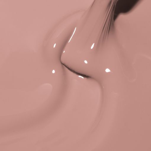 c8962_c Detailaufnahme von cremefarbener Farbe, die auf einem Pinsel verteilt ist.