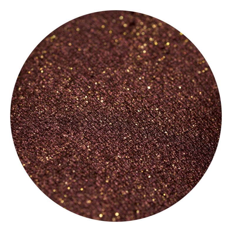 Nahaufnahme eines braunen Glitzer Lidschattens mit goldenen Glitzerpartikeln