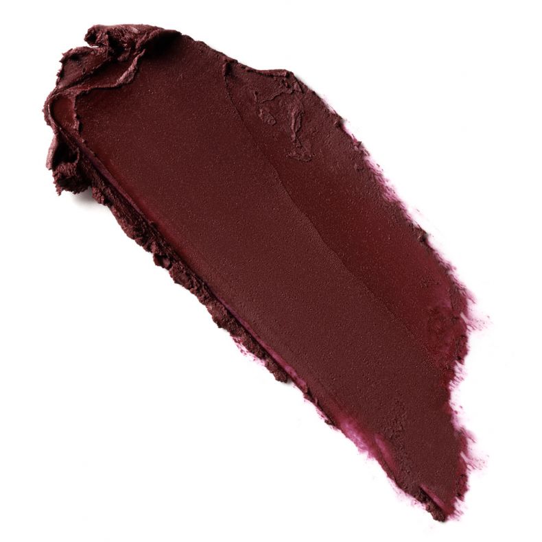 Nahaufnahme eines dunkelroten Lippenstifts auf einem weißen Untergrund