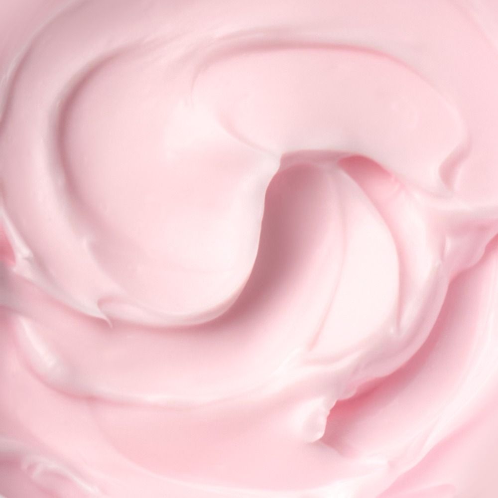 Nahaufnahme einer zartrosa Creme-Textur