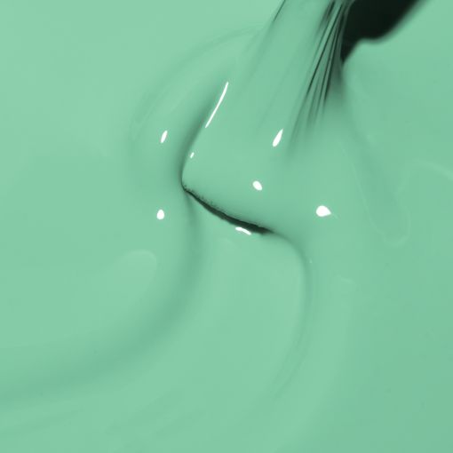 d0326_b Nahaufnahme von mintgrüner Farbe mit einem Pinsel