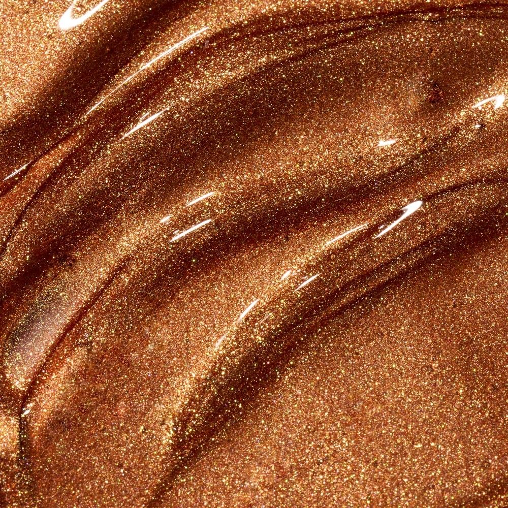 Nahaufnahme einer glänzenden, bronzefarbenen Textur mit Glitzer, die eine luxuriöse Ausstrahlung vermittelt.