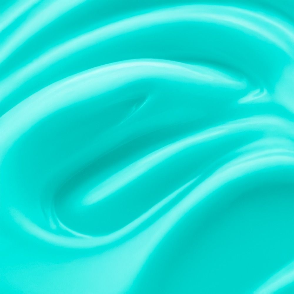 Nahaufnahme einer cremigen, türkisen Textur für Hautpflegeprodukte