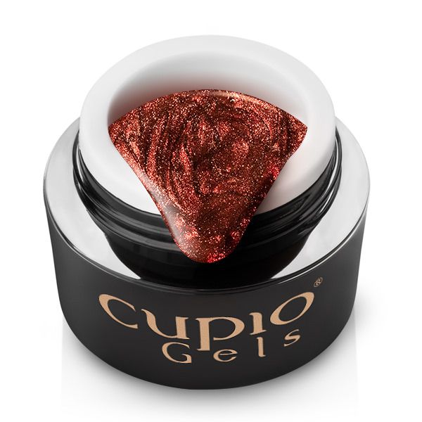 Offenes Glas mit rotem, glitzerndem Nagellack von Cupio Gels