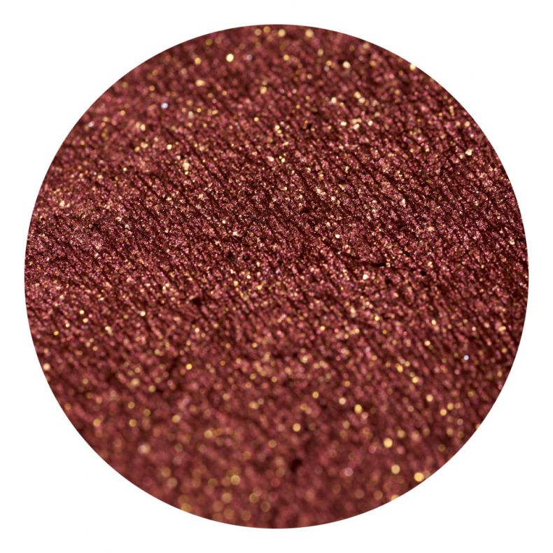 Nahaufnahme eines glitzernden braunen Lidschattens mit goldenen Partikeln