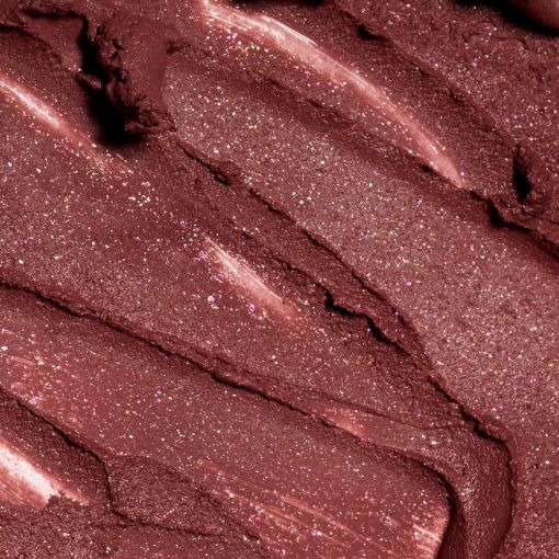 Nahaufnahme von glitzerndem Lippenstift in Rosatönen auf einer glatten Oberfläche