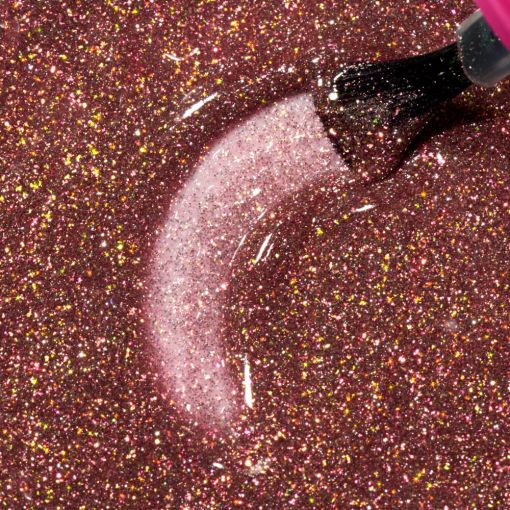 Nahaufnahme von rosa holografischem Glitzer-Nagellack