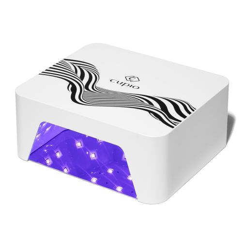 Weiße Cupio UV/LED Nagellampe mit dekorativem Wellenmuster und leuchtenden LEDs zum Aushärten von Gel- und Shellac-Nägeln