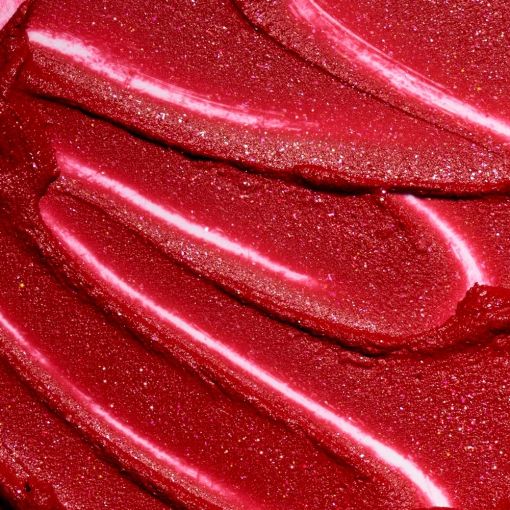 Nahaufnahme von glänzendem rotem Lippenstift mit glitzerndem Finish