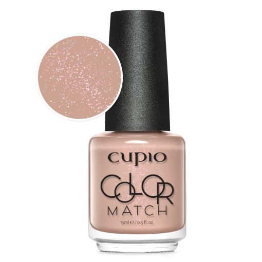 Nagellack von Cupio in Roséfarbe mit glitzernden Elementen im Fläschchen