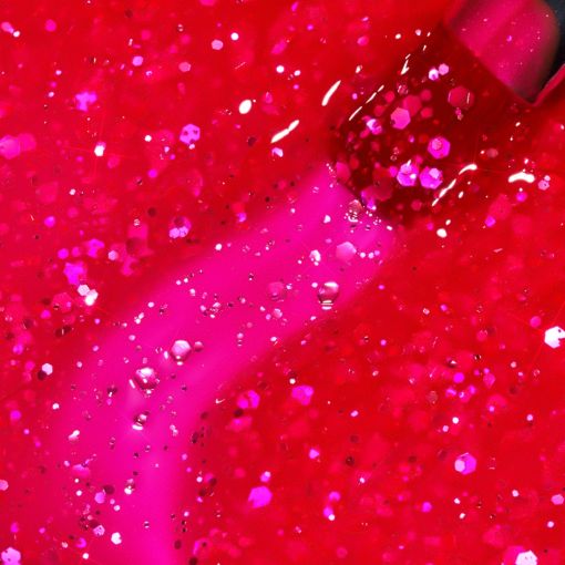 glitter_neon_builder_gel_hot_lips_c9086_b Nahaufnahme von glitzerndem Nagellack in intensiver pinker Farbe