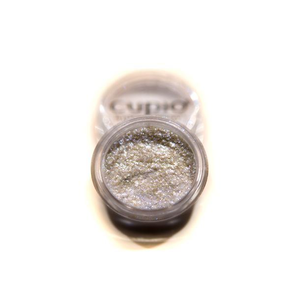 Schimmerndes Glitzerpulver in einem Behälter von Cupio