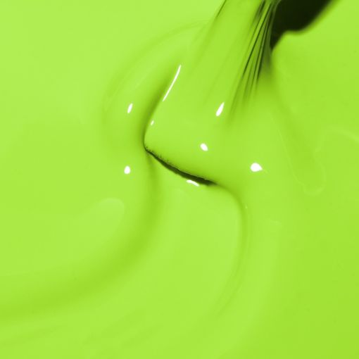 Nahaufnahme von heller grüner Farbe, die in einer Schale fließt
