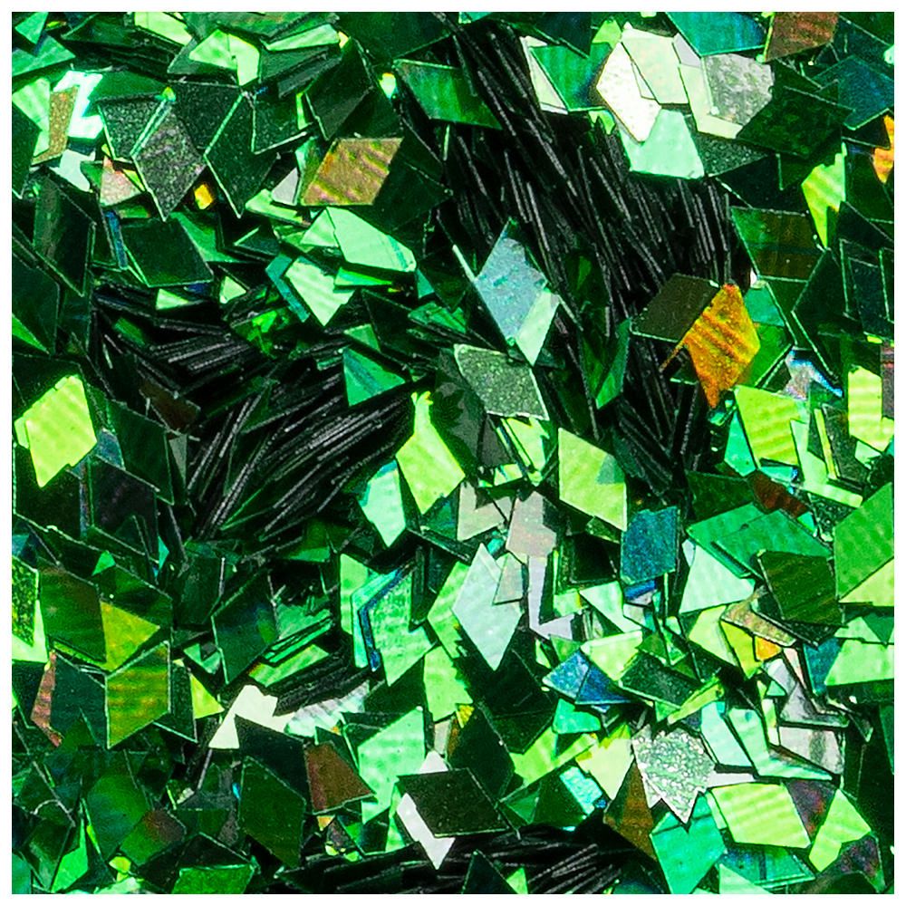 Nahaufnahme von grünen Glitzerpartikeln in verschiedenen Formen