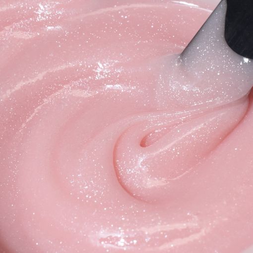 d0645_b Nahaufnahme einer glitzernden rosa Mischung in einer Schüssel