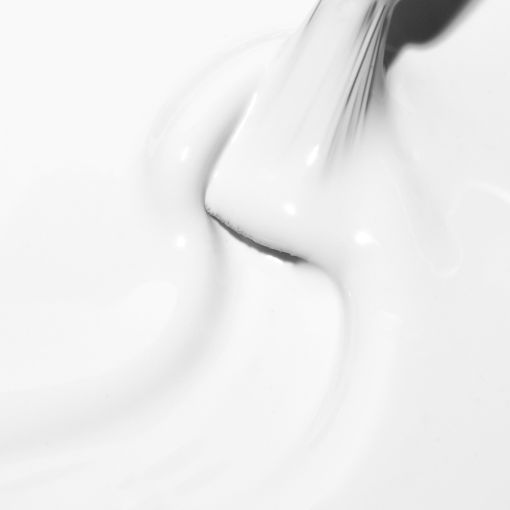 c9973_c Nahaufnahme einer glatten, cremigen Substanz mit einer glänzenden Oberfläche