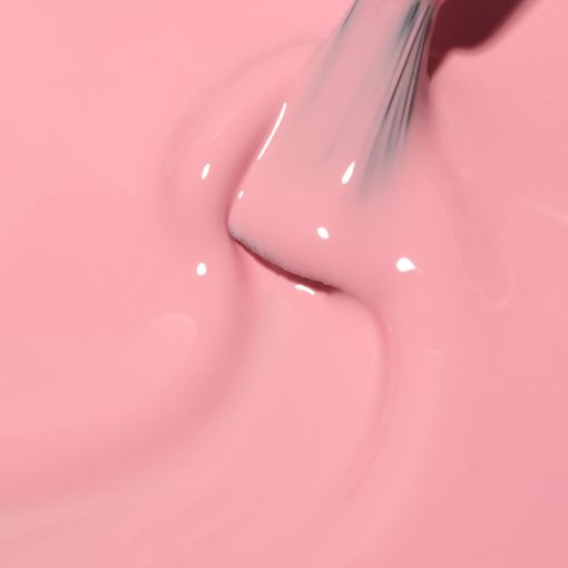 c8850_b Nahaufnahme von rosa Nagellack mit Pinsel auf glatter Oberfläche