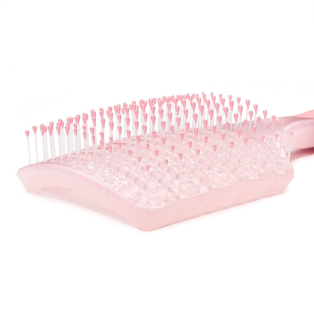 Nahaufnahme einer rosa Paddle-Haarbürste mit vielen feinen Borsten und abgerundeten Noppen zum sanften Entwirren der Haare