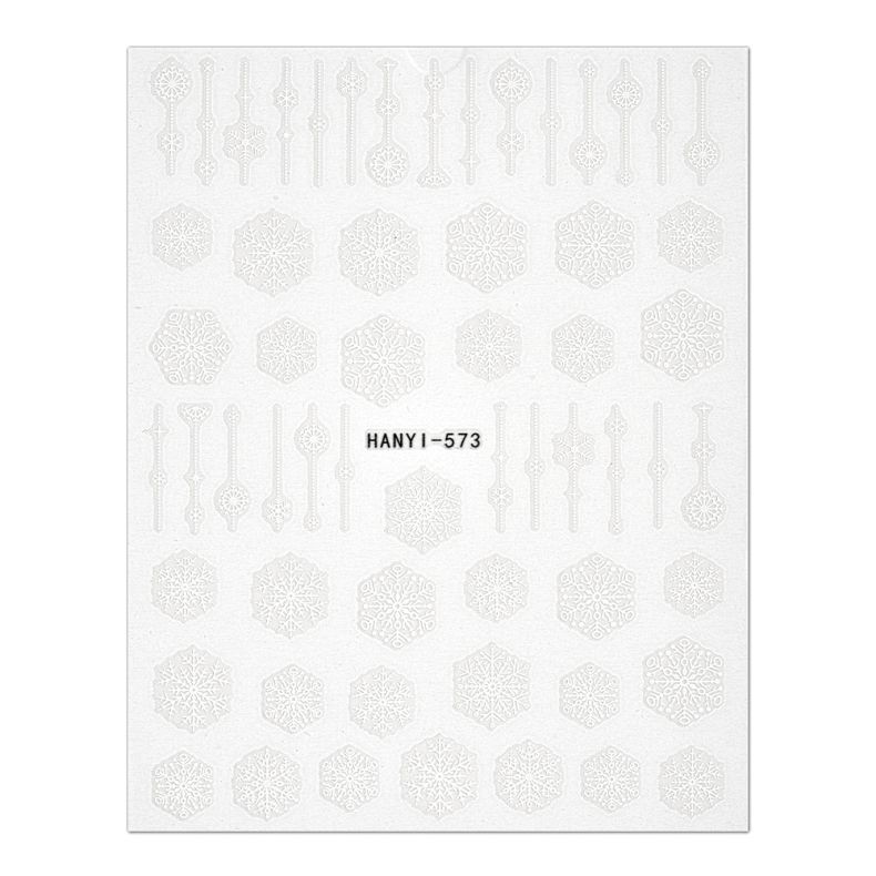 Musterblatt mit Schneeflocken und dekorativen Elementen in Weiß