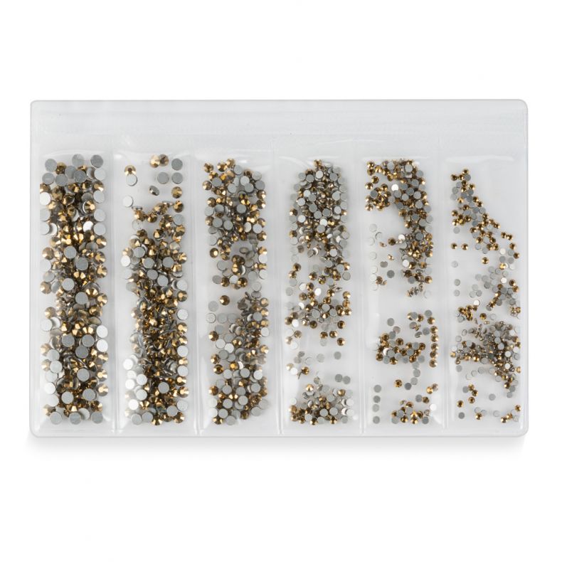 Set von Glitzersteinen in Gold- und Silbertönen, verpackt in transparentem Beutel