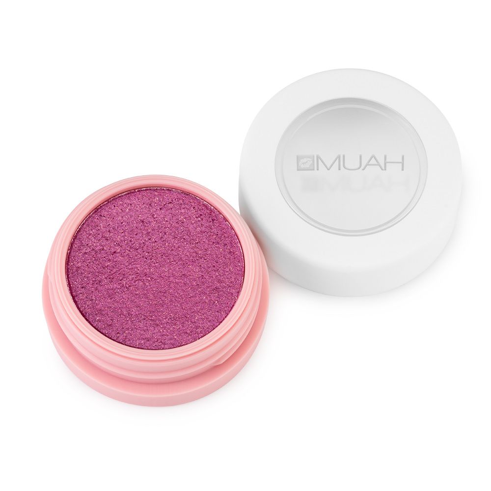 Lidschatten von Muah in einem rosafarbenen Döschen, schimmernde pinke Textur