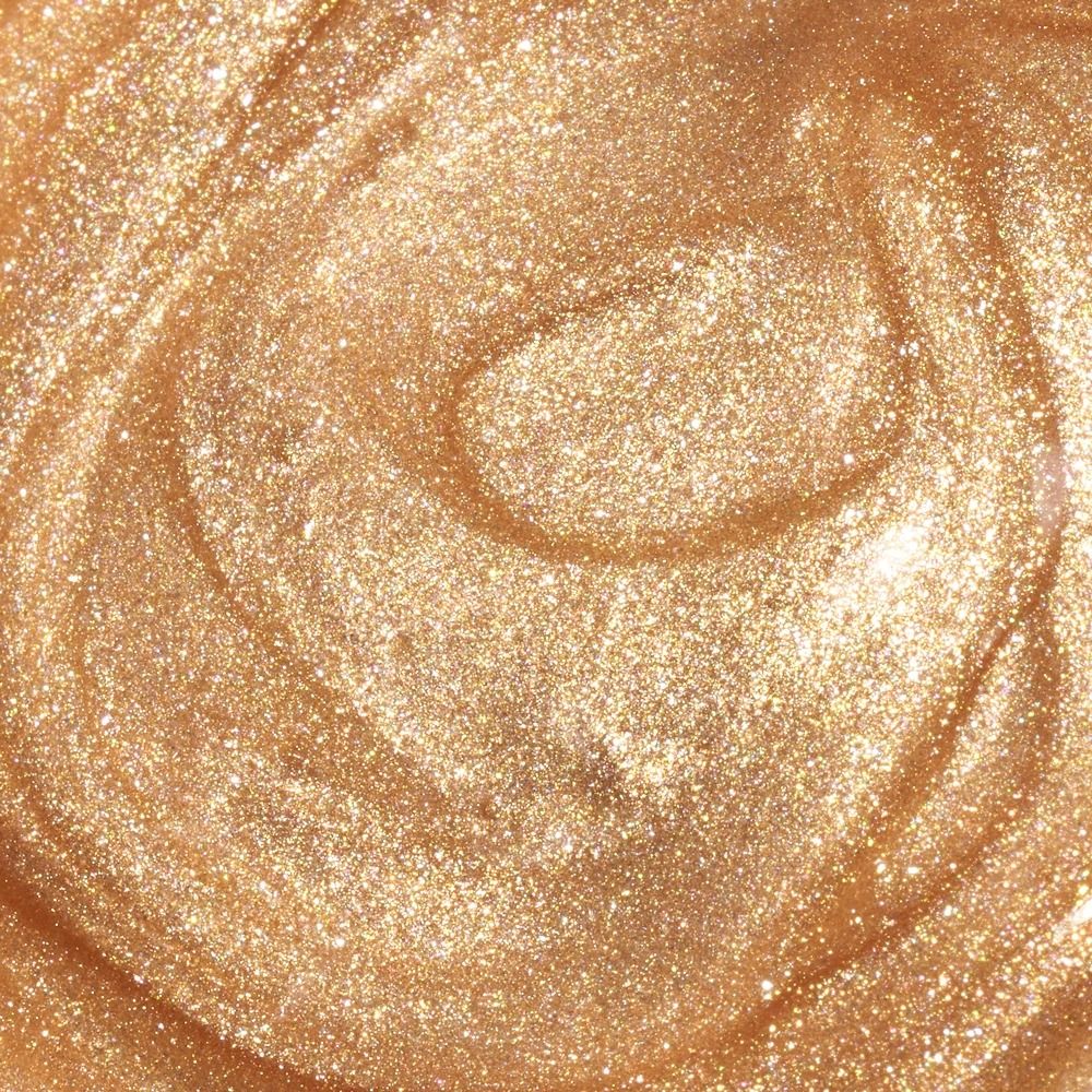 Nahaufnahme einer goldenen Creme mit glitzernden Partikeln
