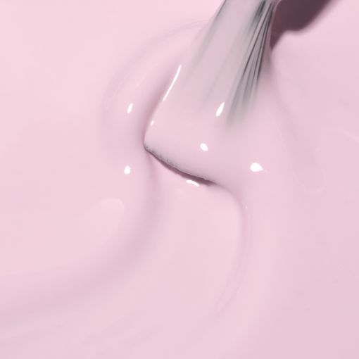 c9202_b Detailaufnahme einer zarten rosa Farbe mit einem Pinsel, der die Oberfläche berührt.