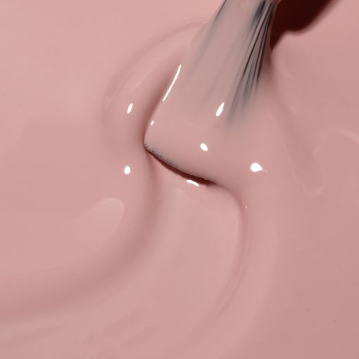 c9209_b Nahaufnahme einer cremigen rosa Farbe mit einem Pinsel